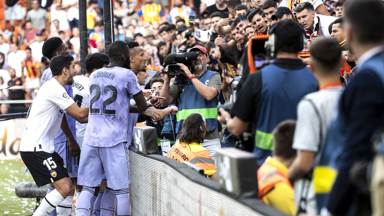 Vinícius Jr. and  Antonio Rudiger confront fans during Real Madrid's game against Valencia.