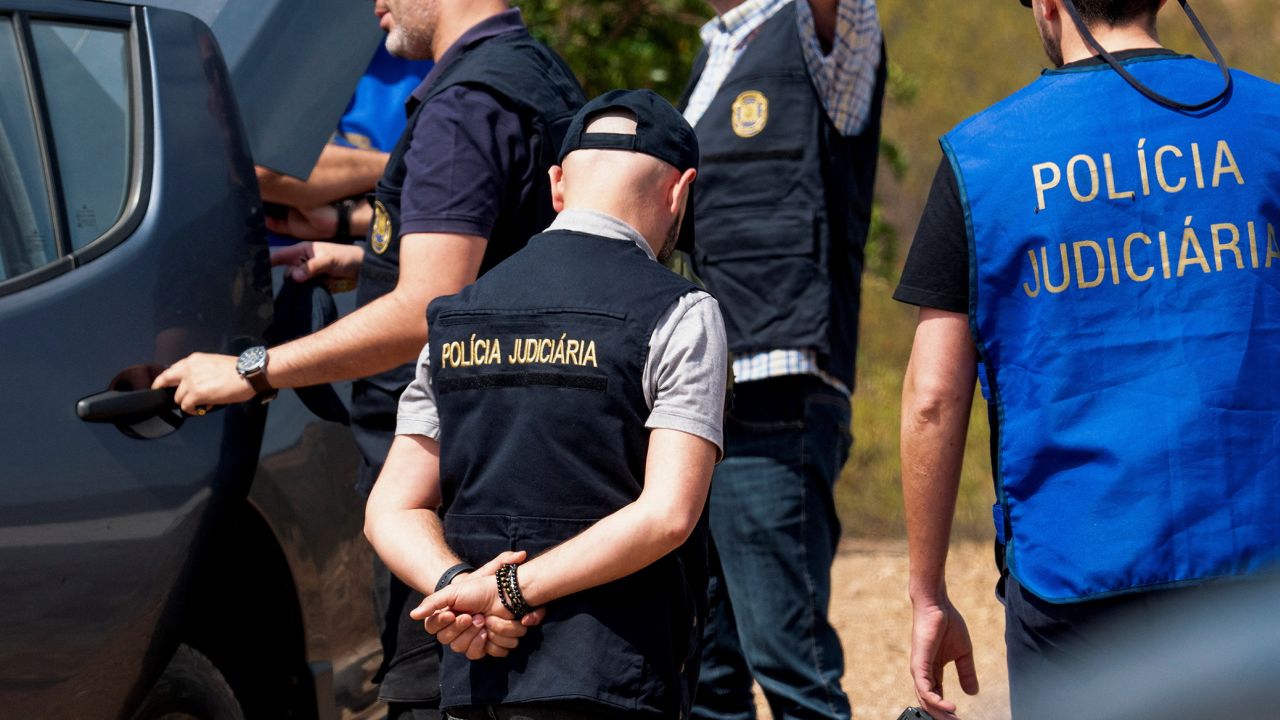 Portugal's investigative Judicial Police are seen at the site of a remote reservoir where a new search for the body of Madeleine McCann is set to take place.