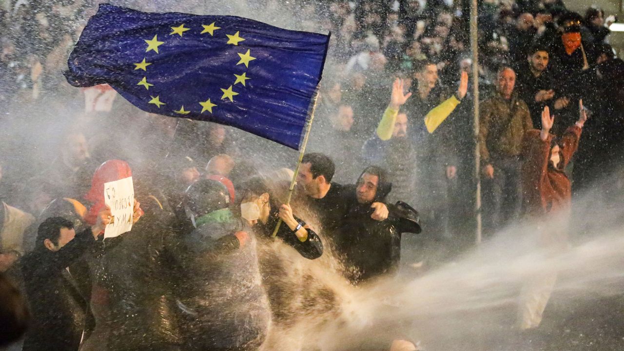 The image of protesters waving an EU flag became a symbol of Georgia's hopes for a European future, during protests on March 7.