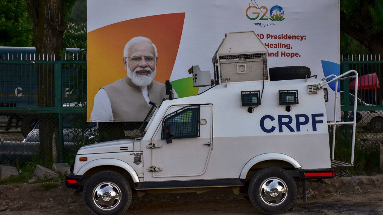 An armored vehicle is seen in front of the G20 summit hoarding ahead of the G20 summit meeting in Srinagar. 
