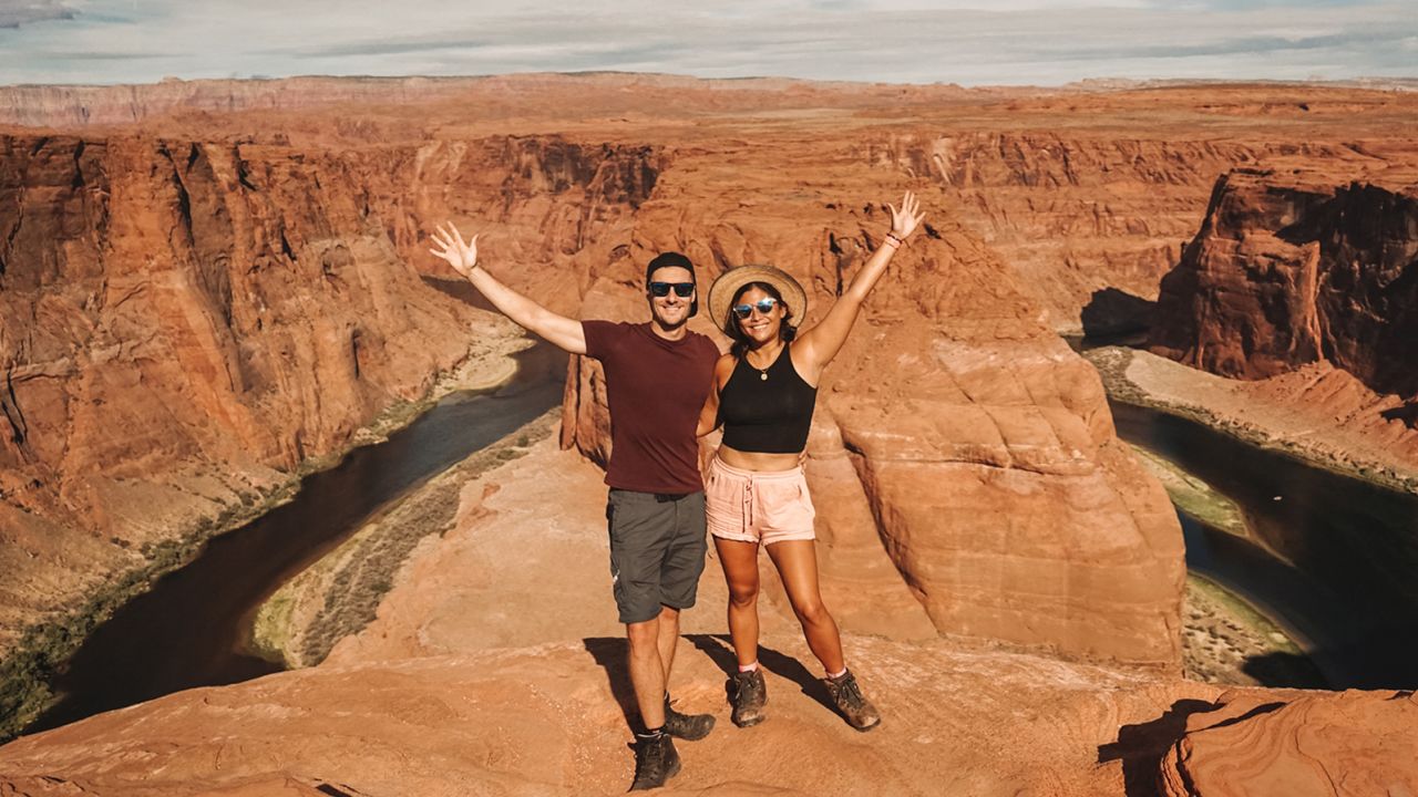 Tom and Anna met in Mui Ne, Vietnam and a couple of days later crossed paths again in Dalat. Here they are pictured hiking Horseshoe Canyon in Canada.