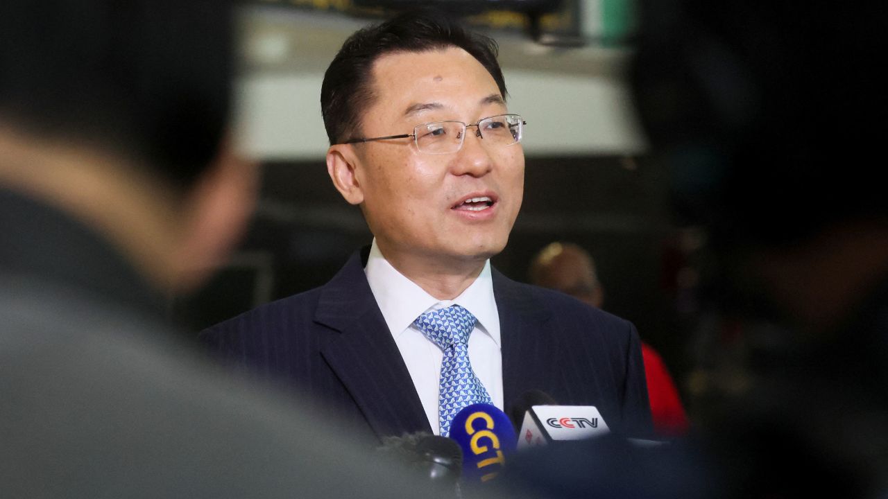 Xie Feng, China's new ambassador to the US, addresses the media as he arrives at JFK airport in New York City on May 23. 