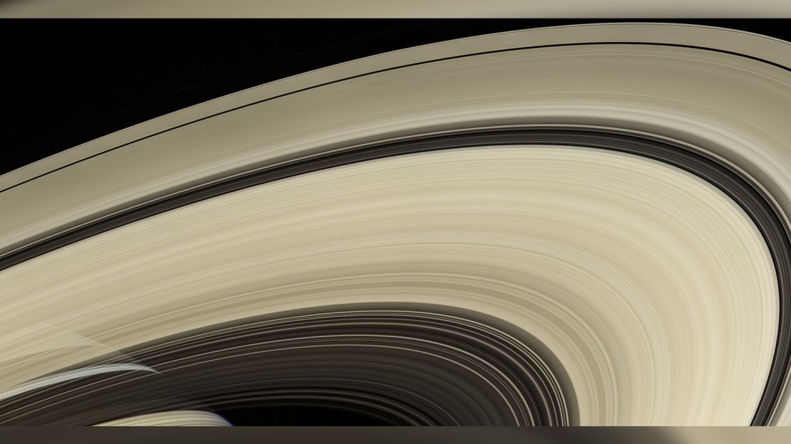 Saturn's rings are made of ice particles that range from the size of sand grains to boulders. The ring system extends up to 175,000 miles (282,000 kilometers) from the planet.