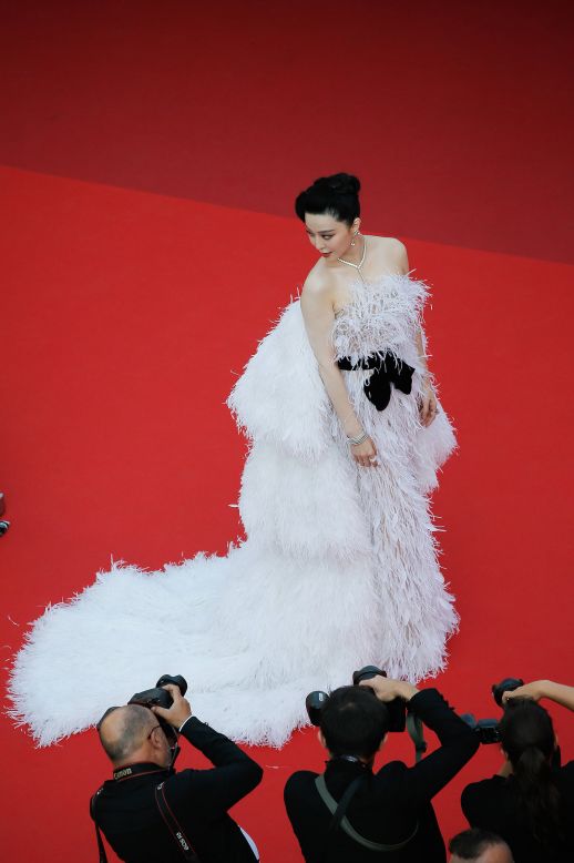 Actor Fan Bingbing has worn a number of eye-catching looks from Asian designers during Cannes, but for the "Asteroid City" premiere, she wore an ostrich-feather couture cape gown from Australian designer Tamara Ralph.
