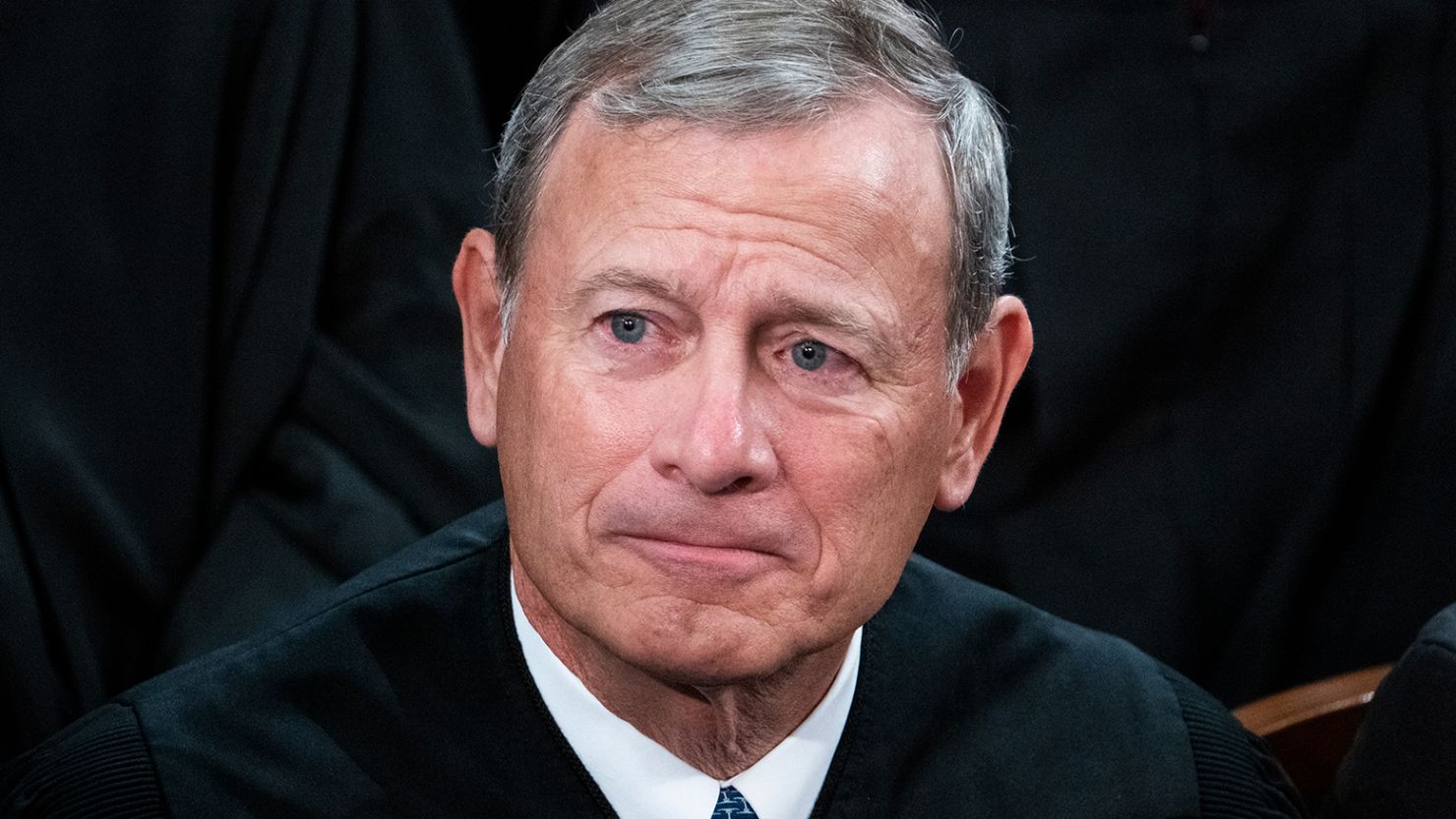 In this file photo, Supreme Court Chief Justice John Roberts attends President Joe Biden's State of the Union address on February 7, 2023. 