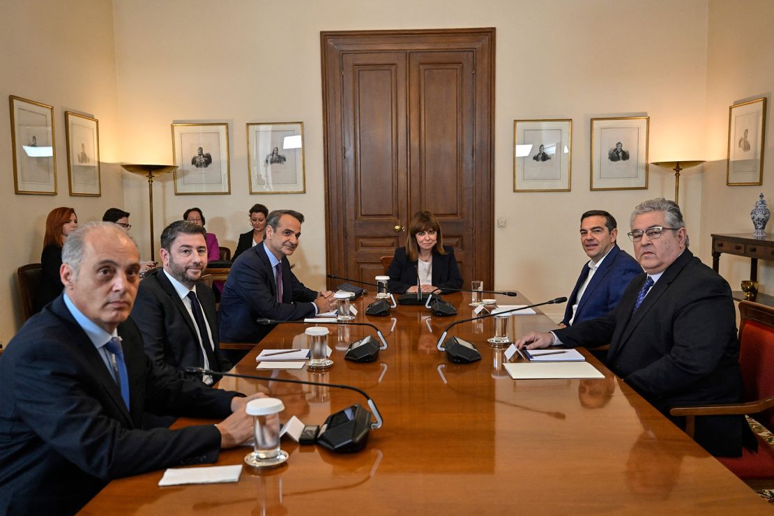 Greece's three main party leaders, pictured at the Presidential Palace in Athens on Wednesday, will run for a second round of elections after they struck down a mandate to form a coalition government.