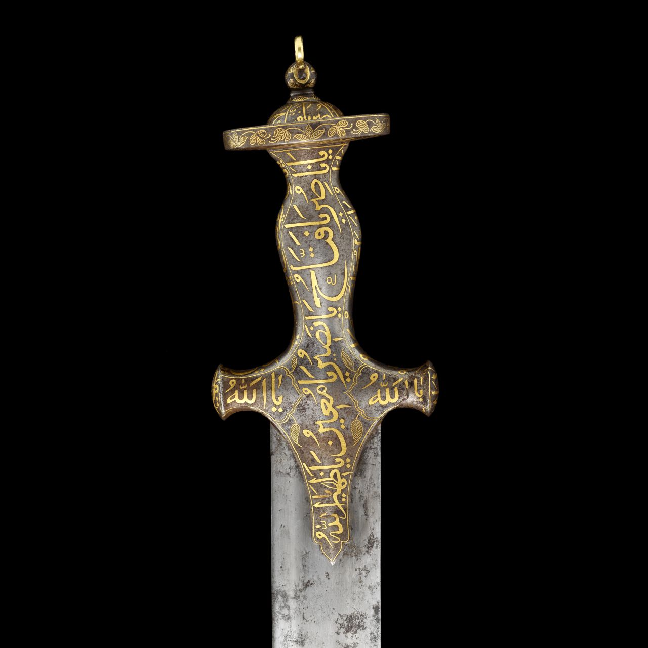 The hilt of the sword is decorated with fine gold calligraphy.
