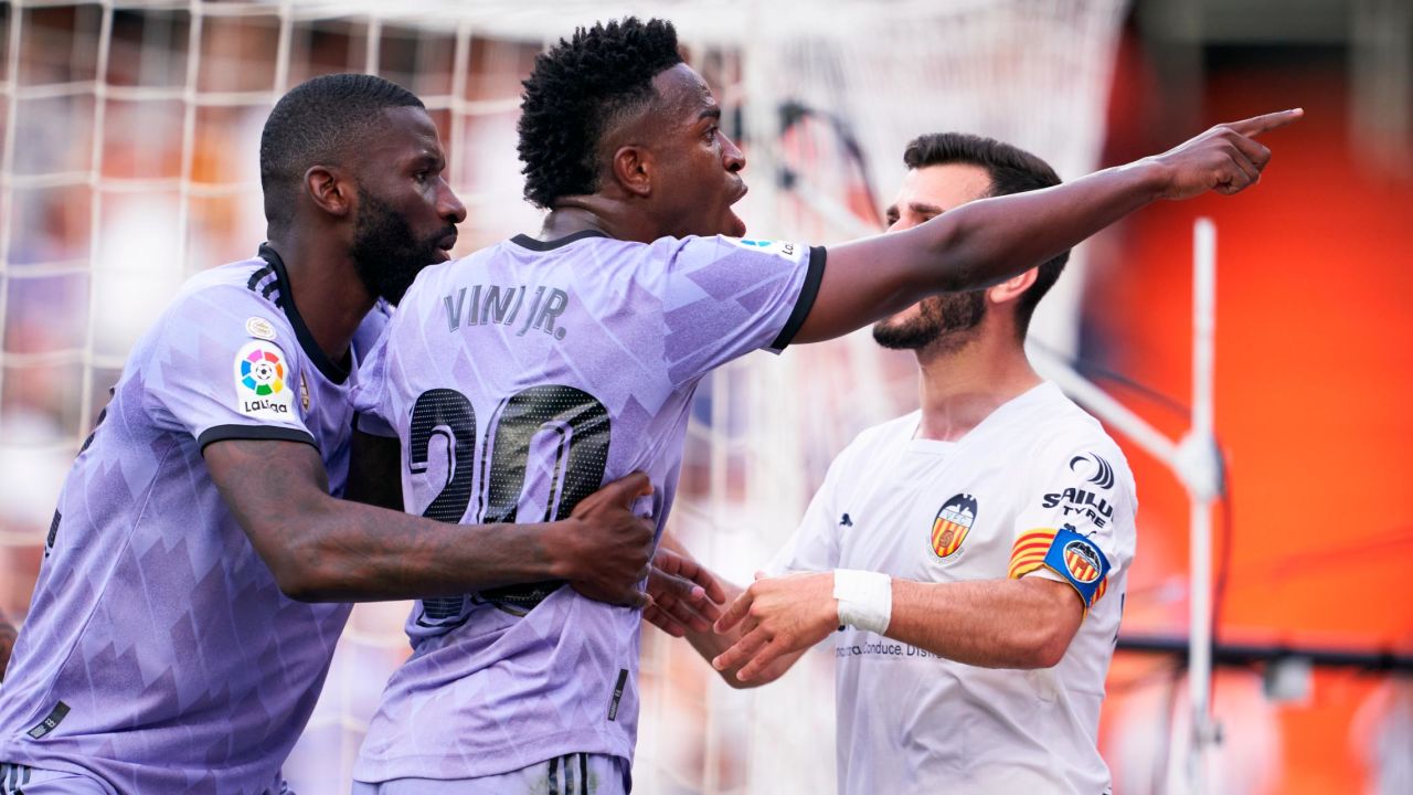 Vinícius Jr. points to a fan in the stand who allegedly racially abused him during Real Madrid's match at Valencia.
