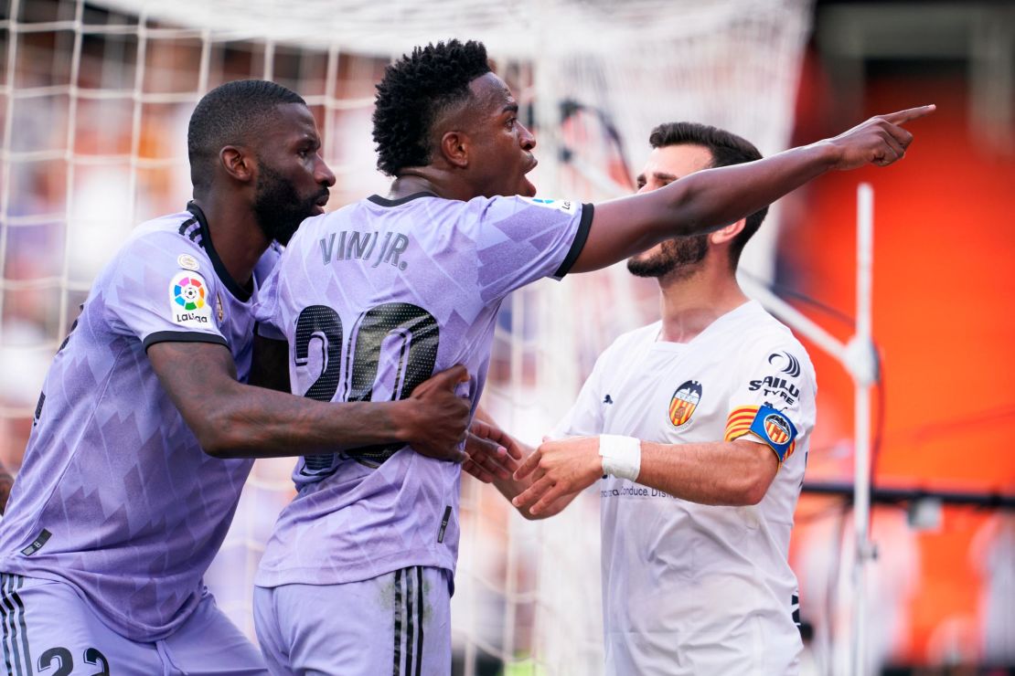 Vinícius Jr. points to a fan in the stand who allegedly racially abused him during Real Madrid's match at Valencia.