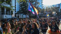 People attend a Pride Parade in Orlando, Florida on October 15, 2022.