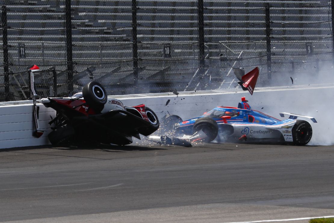 Legge and Stefan Wilson crash in the first turn during practice for the Indianapolis 500.