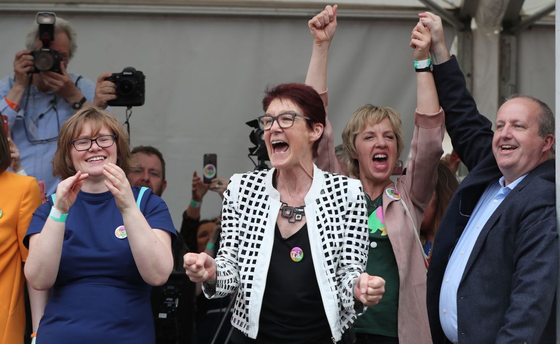 Campaigner Ailbhe Smyth (center) celebrates at Dublin Castle as the results are announced in the referendum on the repeal of the 8th Amendment.