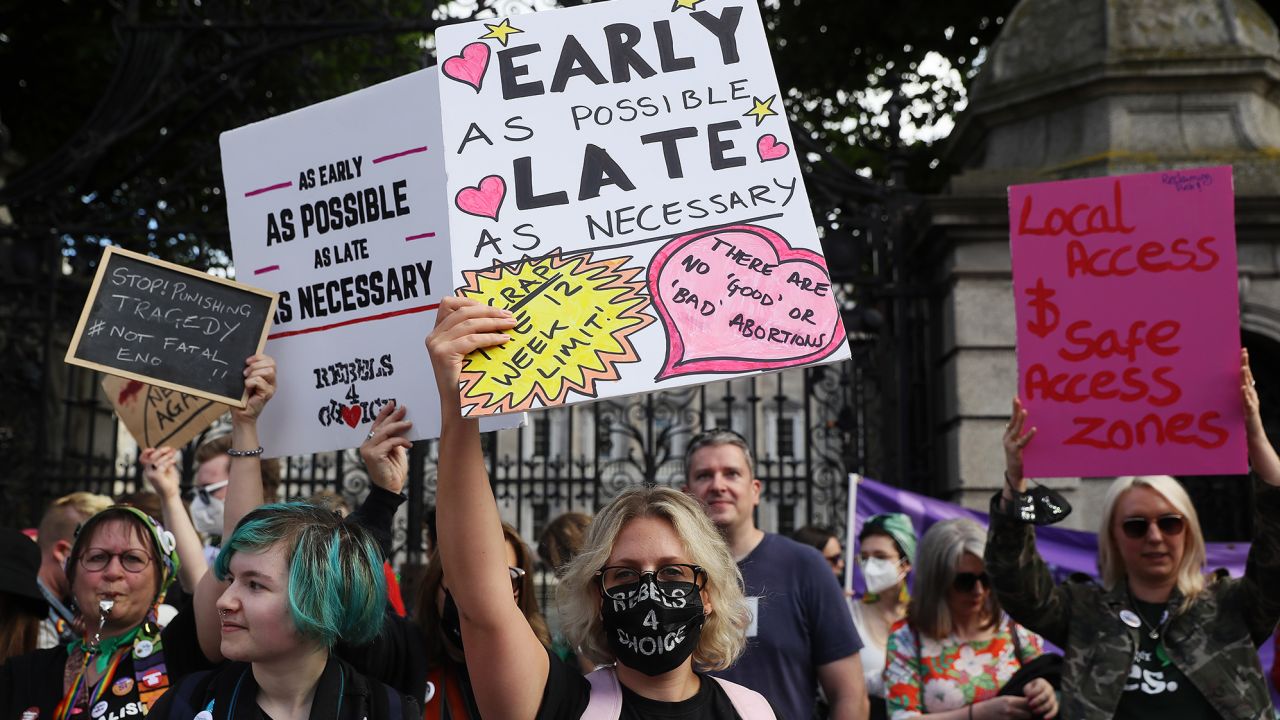 People attend an abortion rights protest outside Leinster House, Dublin, on September 25, 2021.