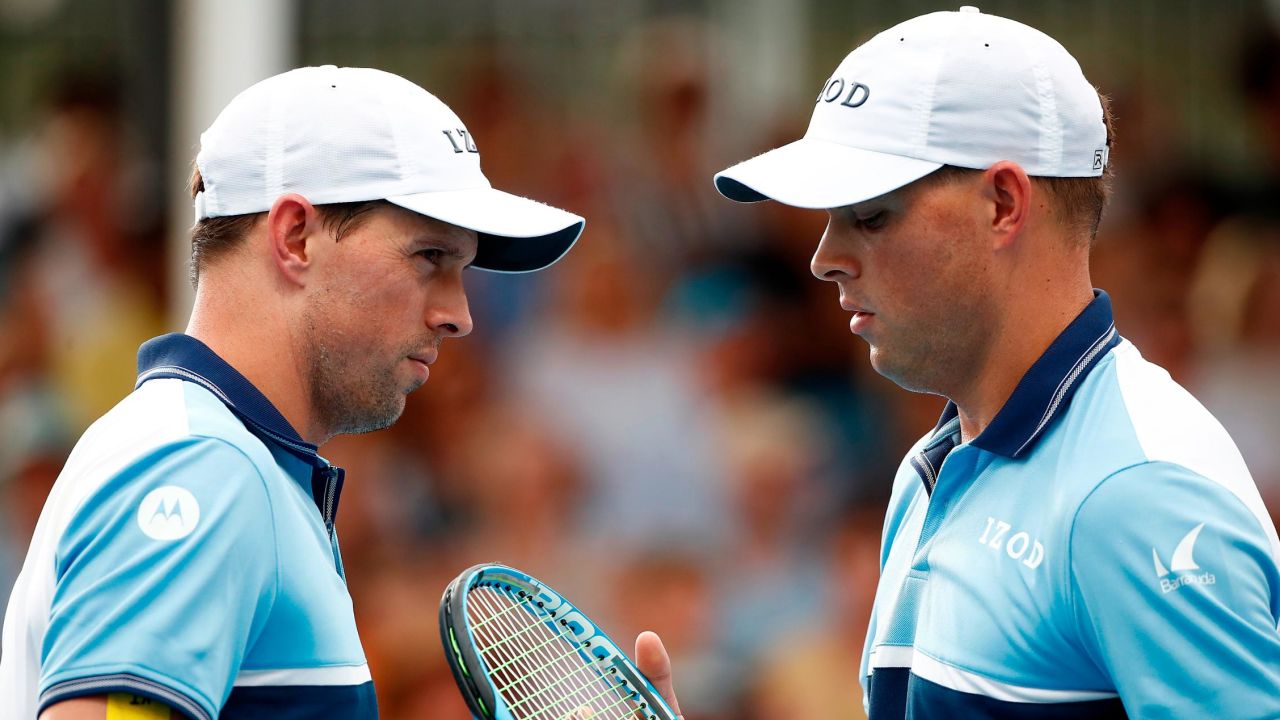 MELBOURNE, AUSTRALIA - JANUARY 22: Bob Bryan and Mike Bryan of the United States talk tactics in their Men's Doubles first round match against Rohan Bopanna of India and Yasutaka Uchiyama of Japan on day three of the 2020 Australian Open at Melbourne Park on January 22, 2020 in Melbourne, Australia. (Photo by Daniel Pockett/Getty Images)