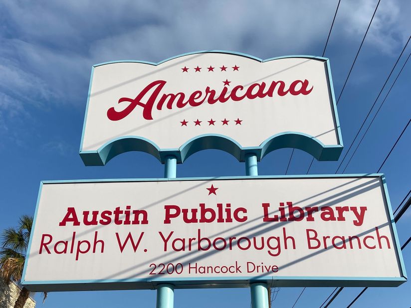 The Americana movie theater, where the female seniors humiliate the freshmen in the film, is now a public library branch.