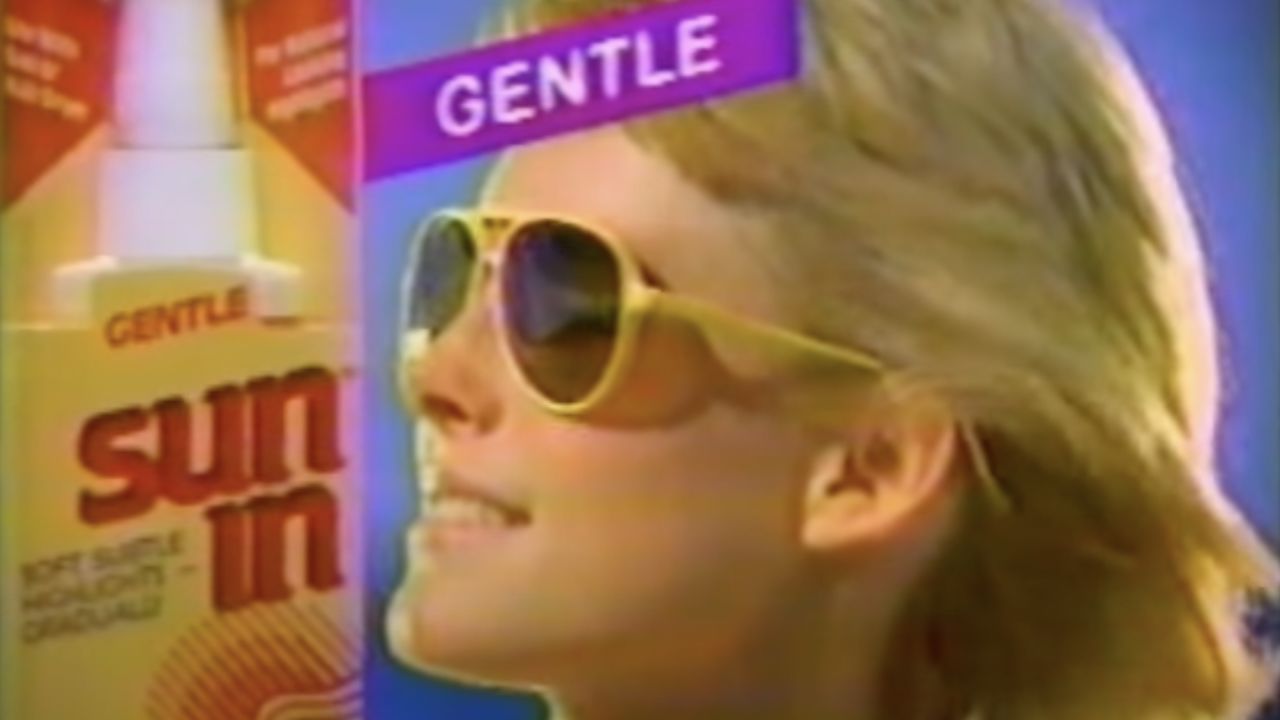 A screenshot from a 1989 commercial for Sun-In hair spray. 