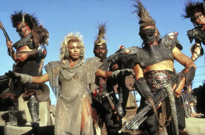 In the 1985 movie "Mad Max Beyond Thunderdome" Turner's love for glittering costumes was given a post-apocalyptic twist in her role as Aunty Entity.