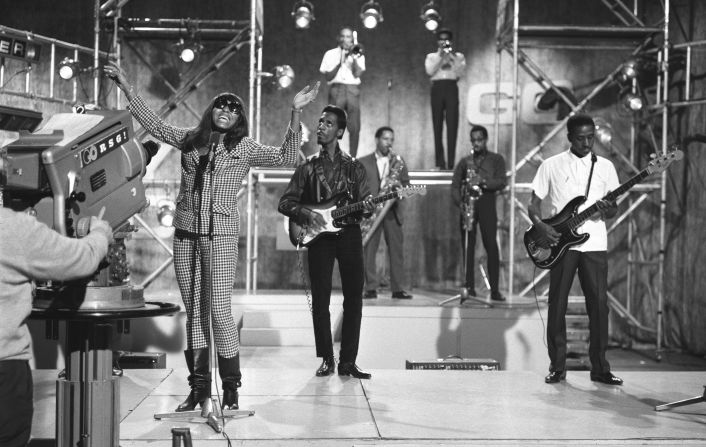 The Turners perform at a TV recording in London in 1966. Tina sang lead on most of their songs while her husband remained in the background, usually on guitar. Offstage, their marriage remained tumultuous.