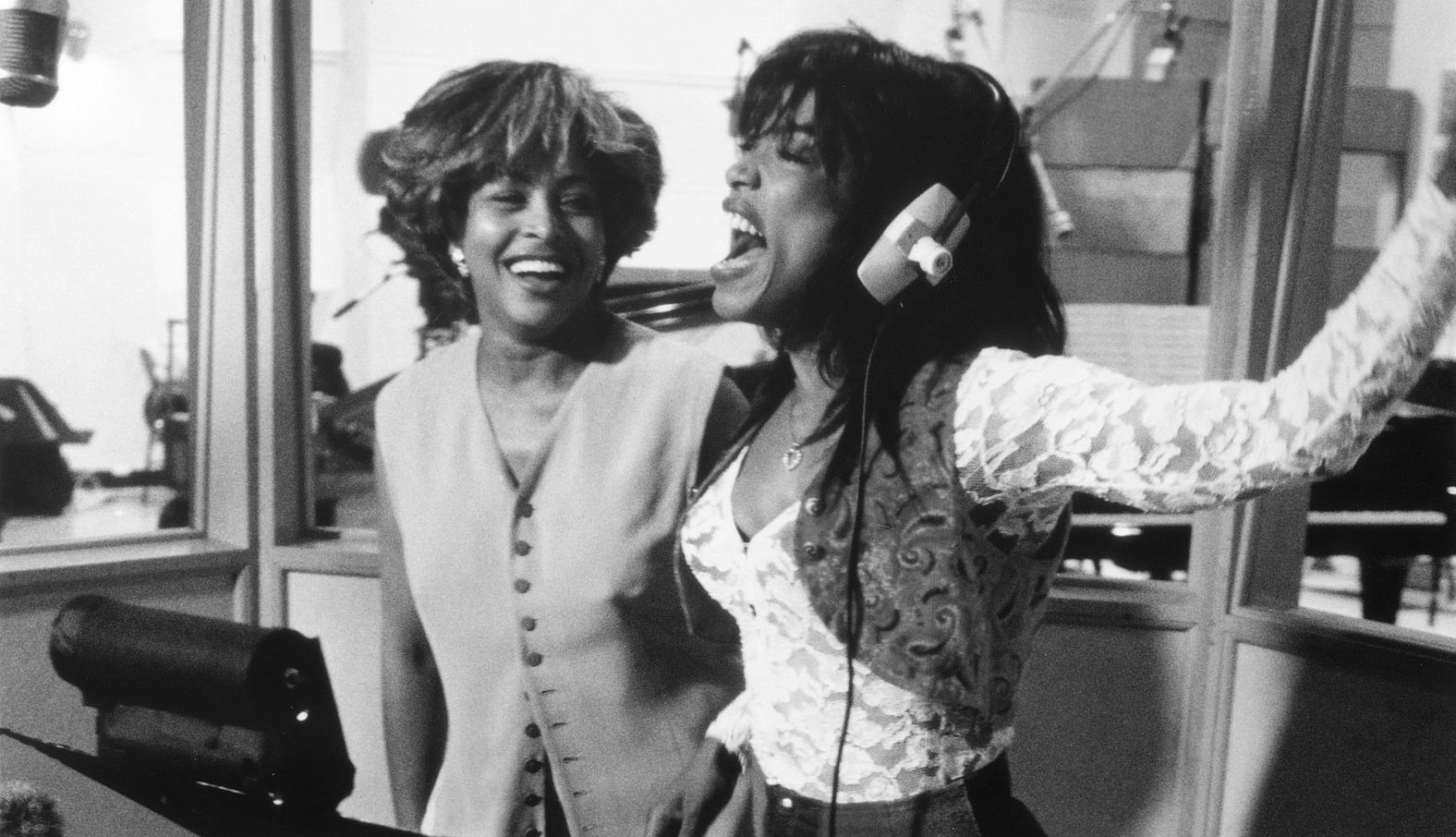 Turner, left, and actress Angela Bassett rehearse a performance as Bassett portrayed her in the 1993 film "What's Love Got to Do With It." Bassett was nominated for an Academy Award and won the Golden Globe Award for best actress.
