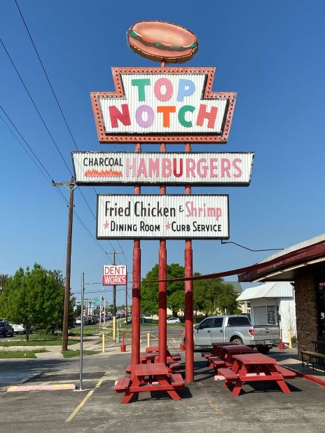 You can still drive up and order a burger and fries to eat in your car at Top Notch, featured in the film.