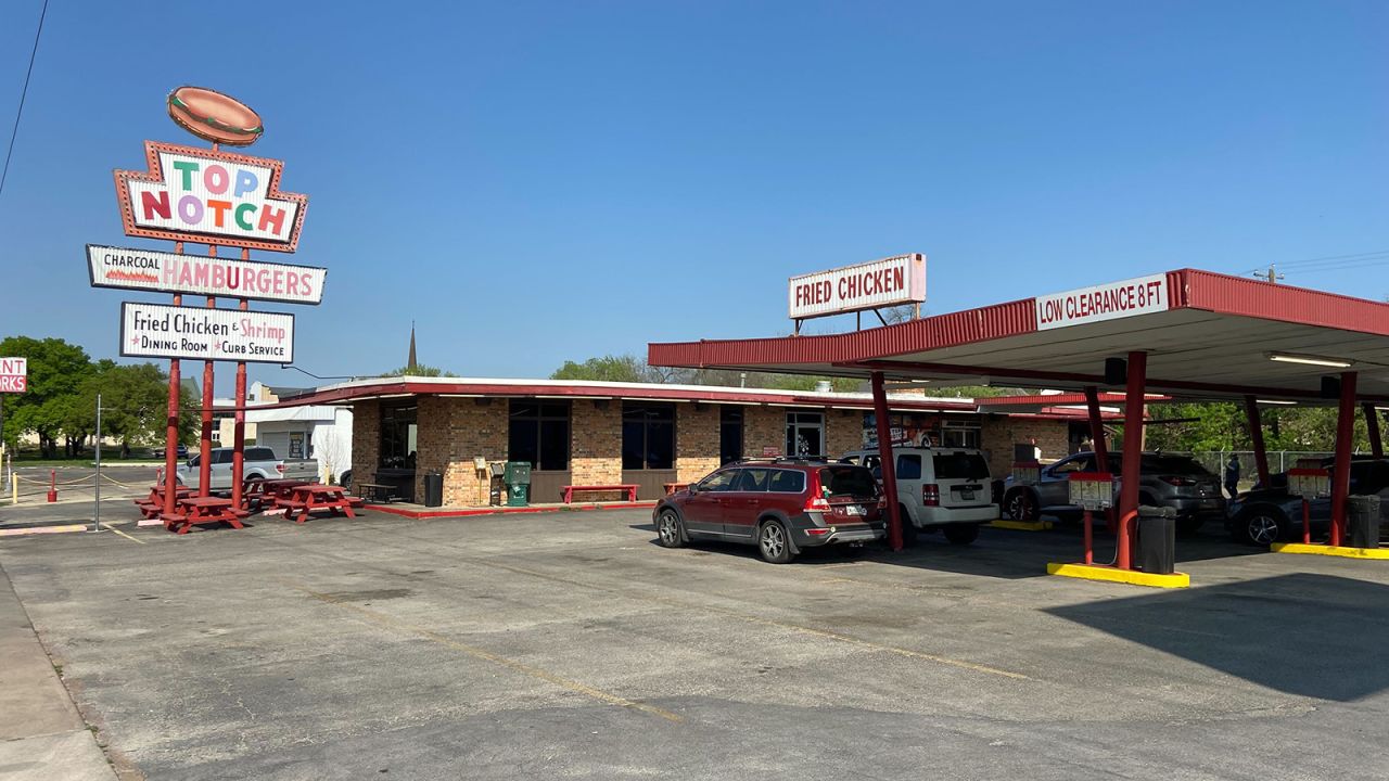 You can still drive up and order a burger and fries to eat in your car at Top Notch.