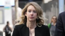 Former Theranos CEO Elizabeth Holmes leaves federal court in San Jose, Calif., March 17, 2023. Holmes has asked a federal judge, Wednesday, May 17, 2023, to allow her to remain free through the Memorial Day weekend before surrendering to authorities on May 30, to begin her more than 11-year prison sentence for defrauding investors in a blood-testing scam.