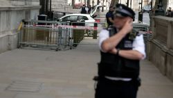 Police investigate at the site of an incident involving a vehicle at Downing Street in London on May 25. 