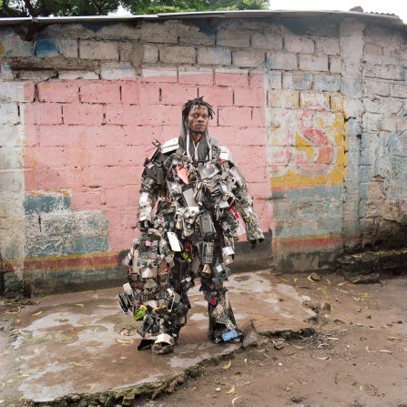 In the capital's Matonge district, Nada Thsibwabwa wears a costume made from recycled mobile phones to raise awareness on waste. The DRC is one of the leading producers of coltan, a key mineral for smartphone production, however imported smartphones are expensive which has led to a big secondhand phone market in Kinshasa.