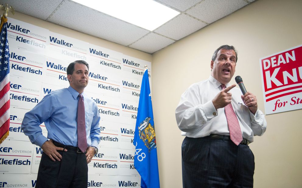 Christie campaigns for Wisconsin Gov. Scott Walker during a stop at the GOP field office in Hudson, Wisconsin, in September 2014.