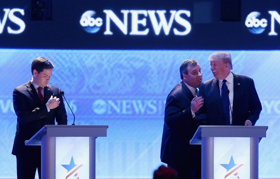 Christie visits with fellow presidential candidate Donald Trump during a commercial break of a Republican debate in February 2016. From the debate's outset, Christie pestered US Sen. Marco Rubio, left. His relentless attack against Rubio, who was surging in the polls, was one of <a href="http://www.cnn.com/2016/02/07/politics/republican-debate-takeaways/index.html" target="_blank">the memorable takeaways of the night</a>.