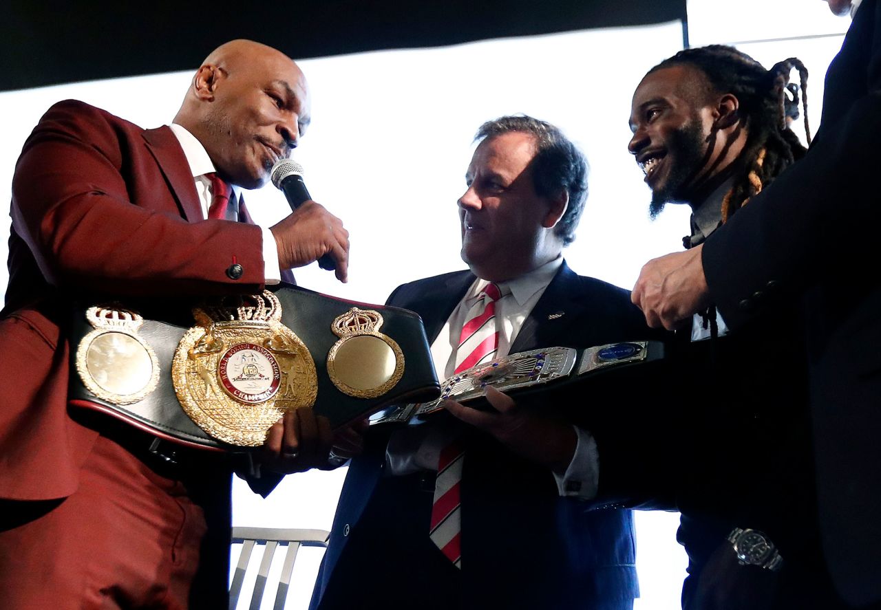 Boxing legend Mike Tyson presents Christie with a belt in April 2017 for the governor's work in helping former prisoners re-enter society.