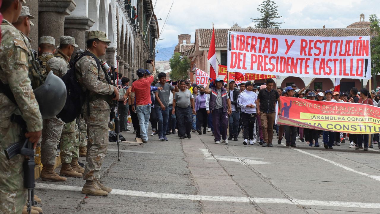 Peruvian Army soldiers stand guard at the main plaza of the central Andean city of Ayacucho on December 15, 2022, after the declaration of a national State of Emergency.