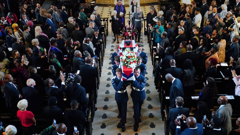 NextImg:After dying alone, hundreds of mourners attend funeral of one of the last RAF 'Pilots of the Caribbean' | CNN