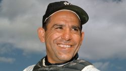 FILE - In this undated file photo, New York Yankee catcher Yogi Berra poses at spring training in Florida. The Hall of Fame catcher renowned as much for his lovable, linguistically dizzying "Yogi-isms" as his unmatched 10 World Series championships with the New York Yankees, died Tuesday, Sept. 22, 2015. He was 90. . (AP Photo/File)