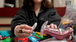 Abby Tow, a Sexual Health Peer Educator at the University of Oklahoma, demonstrates proper use of a ethinylestradiol/etonogestrel vaginal ring at the health center on campus, Wednesday, May 10, in Norman, Oklahoma.