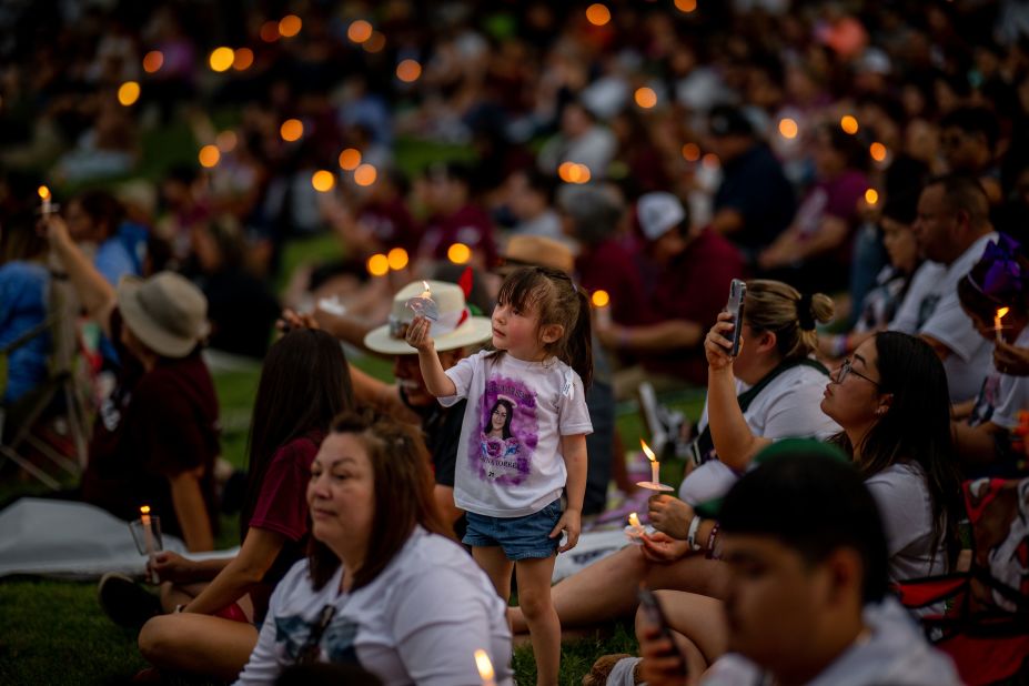 Families in Uvalde, Texas, participate in a candlelight vigil on Wednesday, May 24, to remember the <a href="https://www.cnn.com/interactive/2023/05/us/victims-uvalde-school-shooting/" target="_blank">19 children and two adults</a> who were killed during a mass shooting last year at Robb Elementary School.