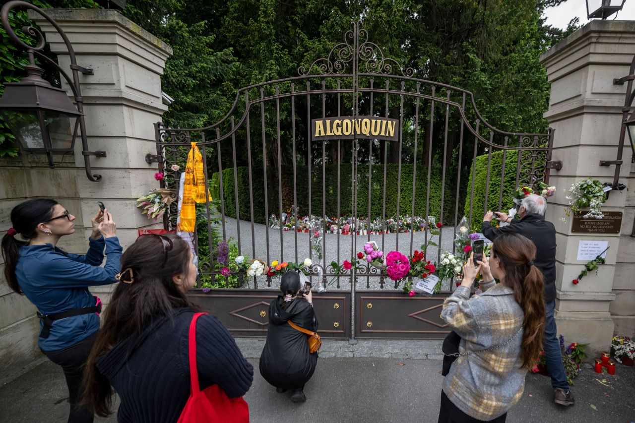 People in Küsnacht, Switzerland, take pictures outside the estate of late singer <a href="https://www.cnn.com/2023/05/24/entertainment/gallery/tina-turner/index.html" target="_blank">Tina Turner</a> on Thursday, May 25. Turner, who rose from humble beginnings and overcame a notoriously abusive marriage to become one of the most popular female artists of all time, <a href="https://www.cnn.com/2023/05/24/entertainment/tina-turner-death/index.html" target="_blank">died this week at the age of 83</a>.