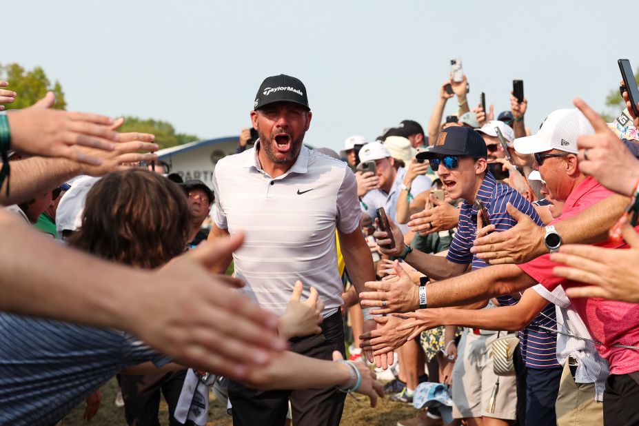 Michael Block celebrates with spectators after hitting a hole-in-one at the PGA Championship on Sunday, May 21. Block, a 46-year-old head pro at a public golf club in California, <a href="https://www.cnn.com/2023/05/21/golf/michael-block-pga-championship-hole-in-one-spt-intl/index.html" target="_blank">finished the tournament in 15th place</a> — good enough to clinch an automatic spot in next year's event.