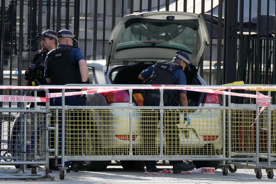 Police in London work at the scene after <a href="https://www.cnn.com/2023/05/25/uk/downing-street-car-crash-gbr-intl/index.html" target="_blank">a car was driven at the gates of Downing Street</a>, the official residence of the UK prime minister, on Thursday, May 25. A man was arrested and there were no reports of any injuries.