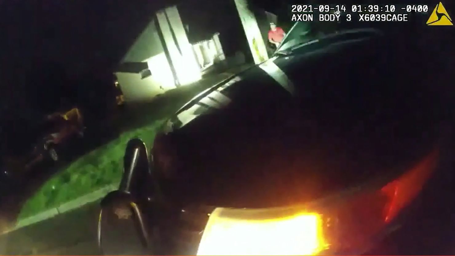 A frame from Officer Salvatore Oldrati's body camera shows the scene moments after leaving his vehicle on September 14, 2021.