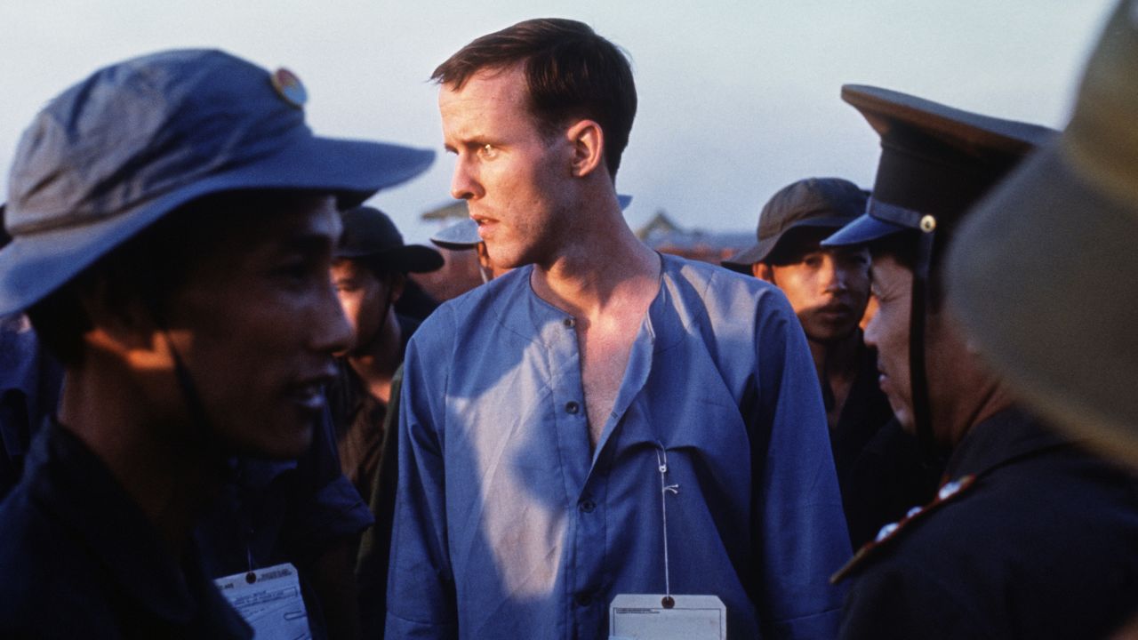 Ken Wallingford is seen in a group of Viet Cong and North Vietnamese Army personnel after his released at Loc Ninh, Vietnam, on February 12, 1973.