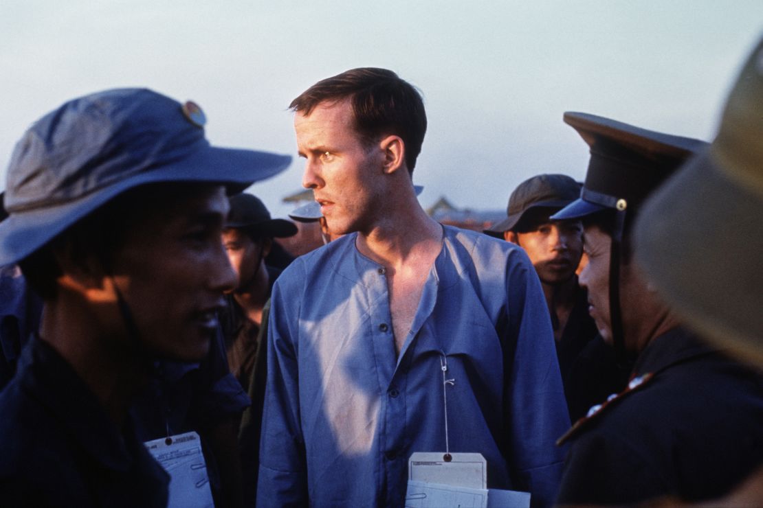 Ken Wallingford is seen in a group of Viet Cong and North Vietnamese Army personnel after his released at Loc Ninh, Vietnam, on February 12, 1973.