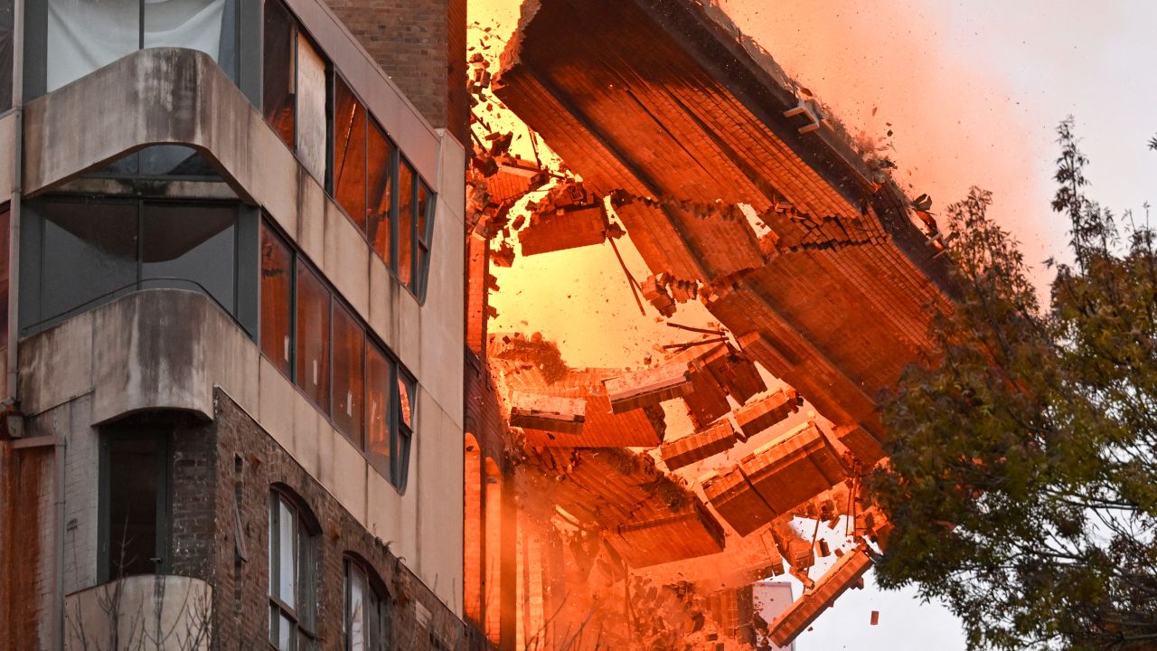 A wall collapses during a building fire in Sydney, Australia, on May 25.