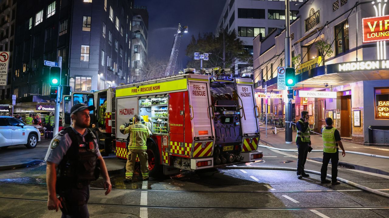 Firemen at the scene of a fire at a building in Sydney on May 25. 