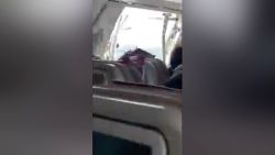 Terrifying moments as plane door opens midair on Asiana Airlines flight.