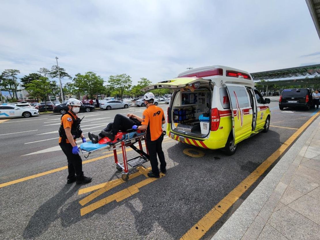 Injured Asiana Airlines passengers are taken to Daegu hospital after a door on their plane from Jeju opened mid-air shortly before landing.