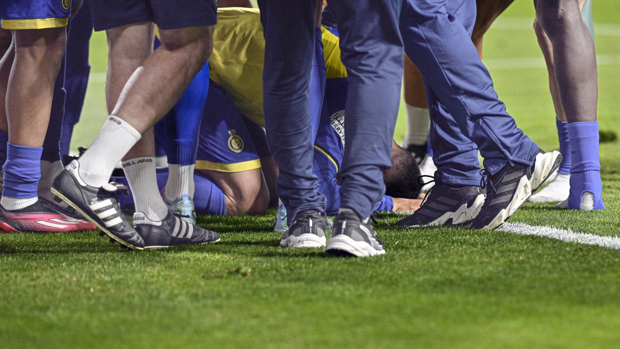 Portuguese star player Cristiano Ronaldo takes a low bow after scoring a goal during the match between Al Nassr and Al-Shabab on May 23. 