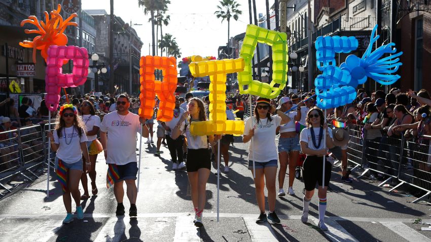 TAMPA, FL - MARCH 26: Revelers celebrate on 7th Avenue during the Tampa Pride Parade in the Ybor City neighborhood on March 26, 2022 in Tampa, Florida. The Tampa Pride was held in the wake of the passage of Florida's controversial "Don't Say Gay" Bill. 
