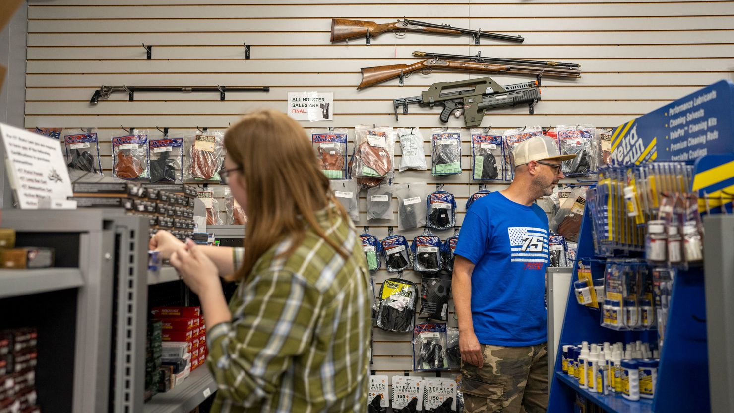 Customers inside a Tobacco Valley Gun store in East Windsor, Connecticut, on June 17, 2022. 