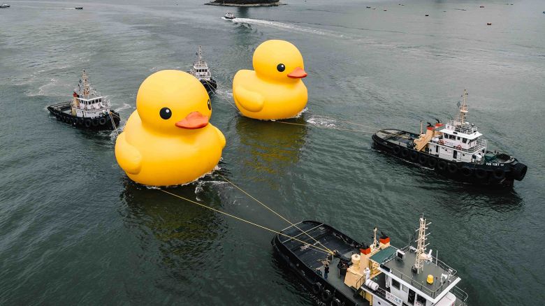 A pair of giant rubber ducks are seen in Hong Kong on May 25, 2023.